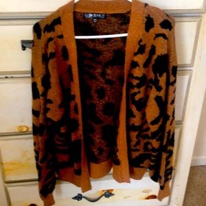 Small leopard kinda print sweater